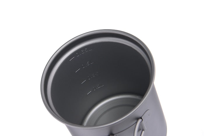 A lightweight titanium cooking pot set designed for outdoor camping and hiking, showcasing its sleek design and durable material.