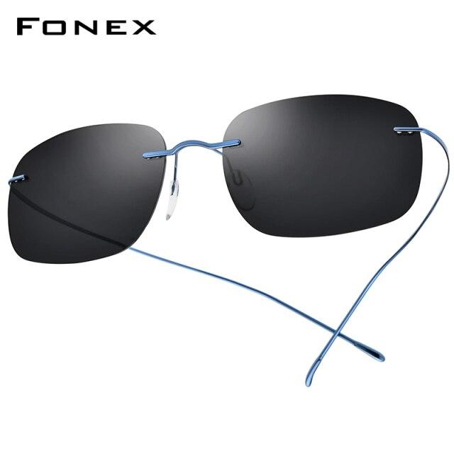 A pair of ultralight titanium rimless sunglasses for men, featuring polarized UV400 lenses and a stylish frameless design.