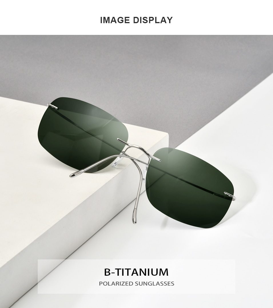 A pair of ultralight titanium rimless sunglasses for men, featuring polarized UV400 lenses and a stylish frameless design.