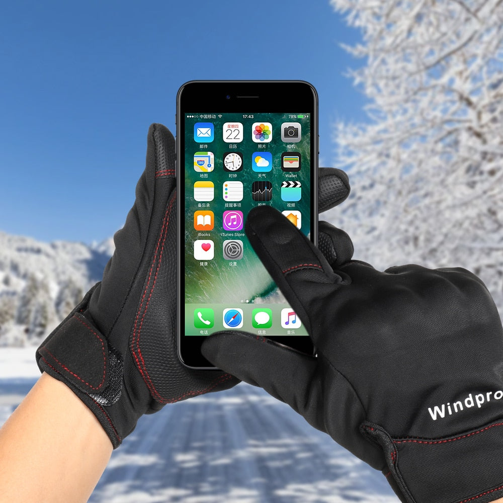 A pair of black touch screen motorcycle gloves designed for winter riding, featuring thermal insulation and non-slip grip.