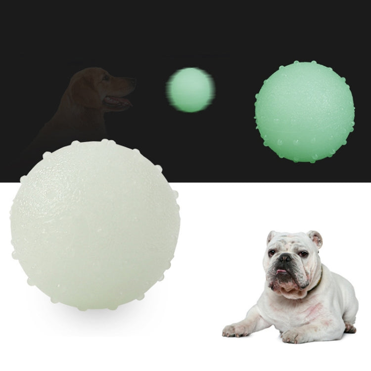 Large TPR Bite Resistant Luminous Bouncy Ball for dogs, glowing in the dark, showcasing its soft and elastic texture.