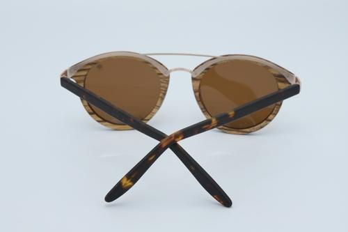 Stylish Trend Sunglasses made from zebra skateboard wood with brown polarized lenses and spring metal hinges, displayed in an eco-friendly wood box.