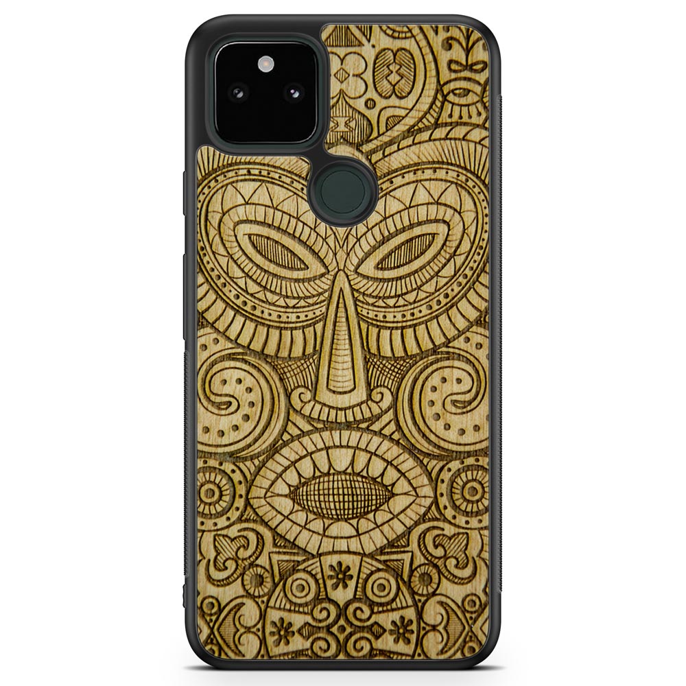 Tribal Mask wooden phone case held in hand, showcasing its unique design and natural wood grain.