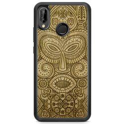 Tribal Mask wooden phone case held in hand, showcasing its unique design and natural wood grain.