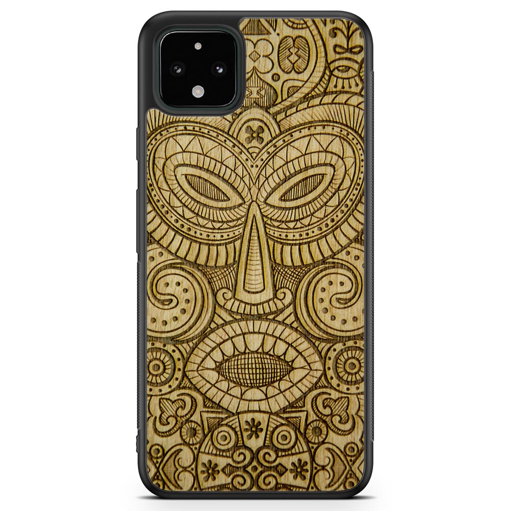 Tribal Mask wooden phone case held in hand, showcasing its unique design and natural wood grain.