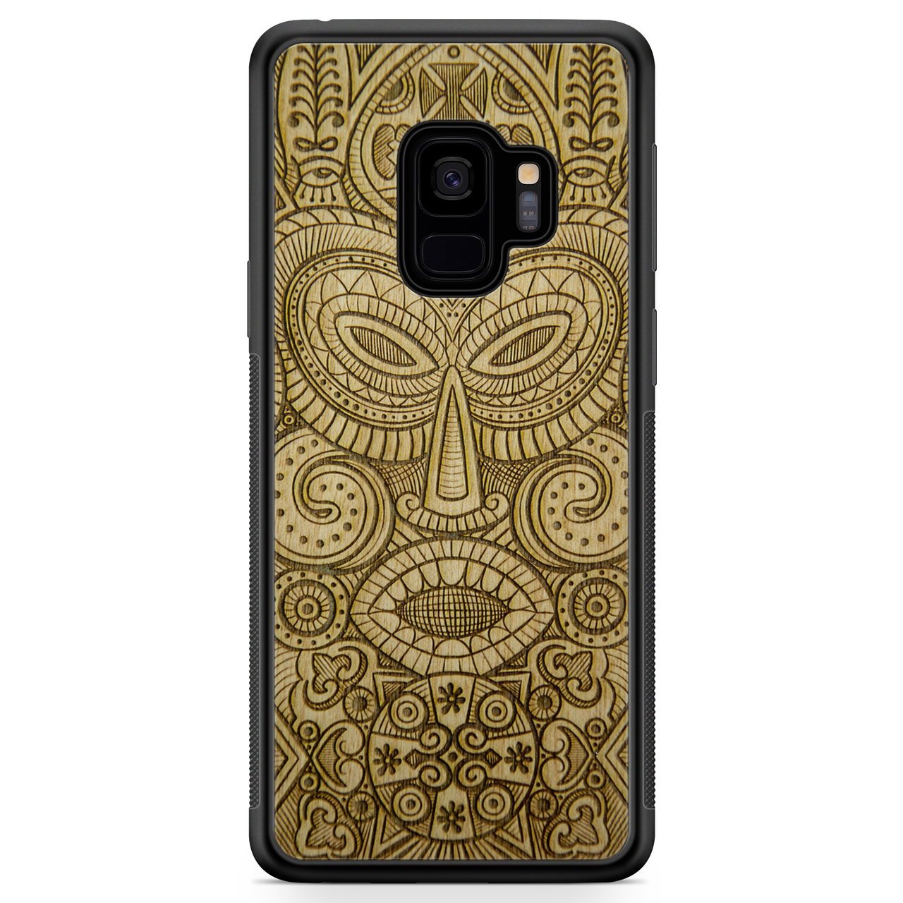 Tribal Mask wooden phone case held in hand, showcasing its unique design and natural wood grain.