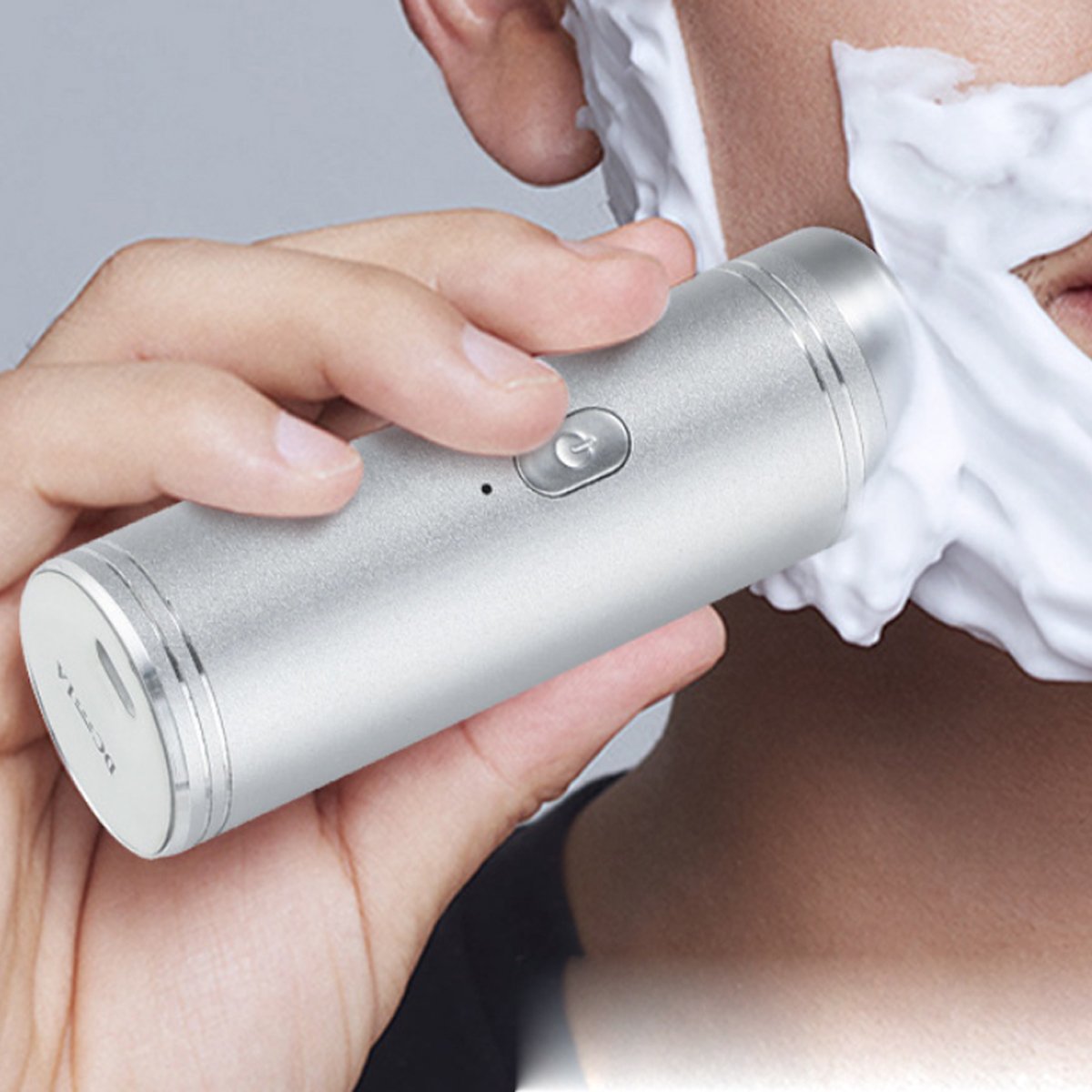 True Time Saver USB Shaver Mini showcasing its sleek stainless steel design and 4D floating blades for efficient shaving.