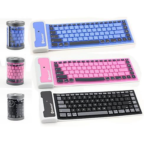 Flexible Silicone Bluetooth Keyboard rolled out for typing, showcasing its soft touch keys and vibrant color options.