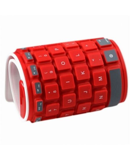 Flexible Silicone Bluetooth Keyboard rolled out for typing, showcasing its soft touch keys and vibrant color options.