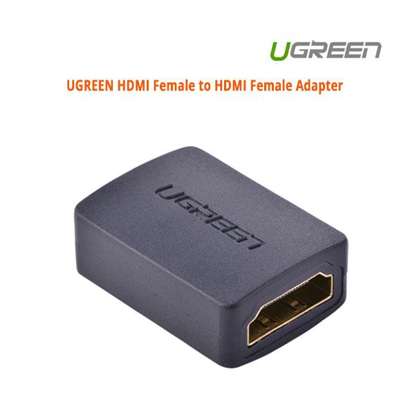 UGREEN HDMI Female to Female Adapter with two HDMI ports for connecting cables.