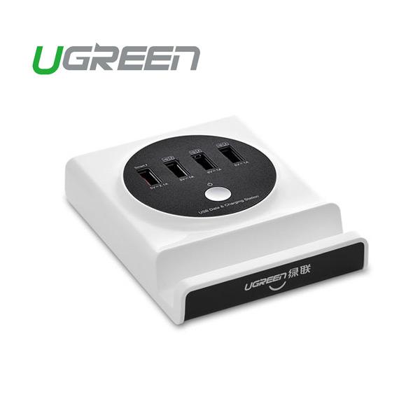 UGREEN Multifunction USB Charging Station with OTG USB Hub, featuring multiple USB ports and a cradle design for easy device viewing.