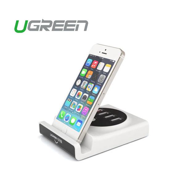 UGREEN Multifunction USB Charging Station with OTG USB Hub, featuring multiple USB ports and a cradle design for easy device viewing.