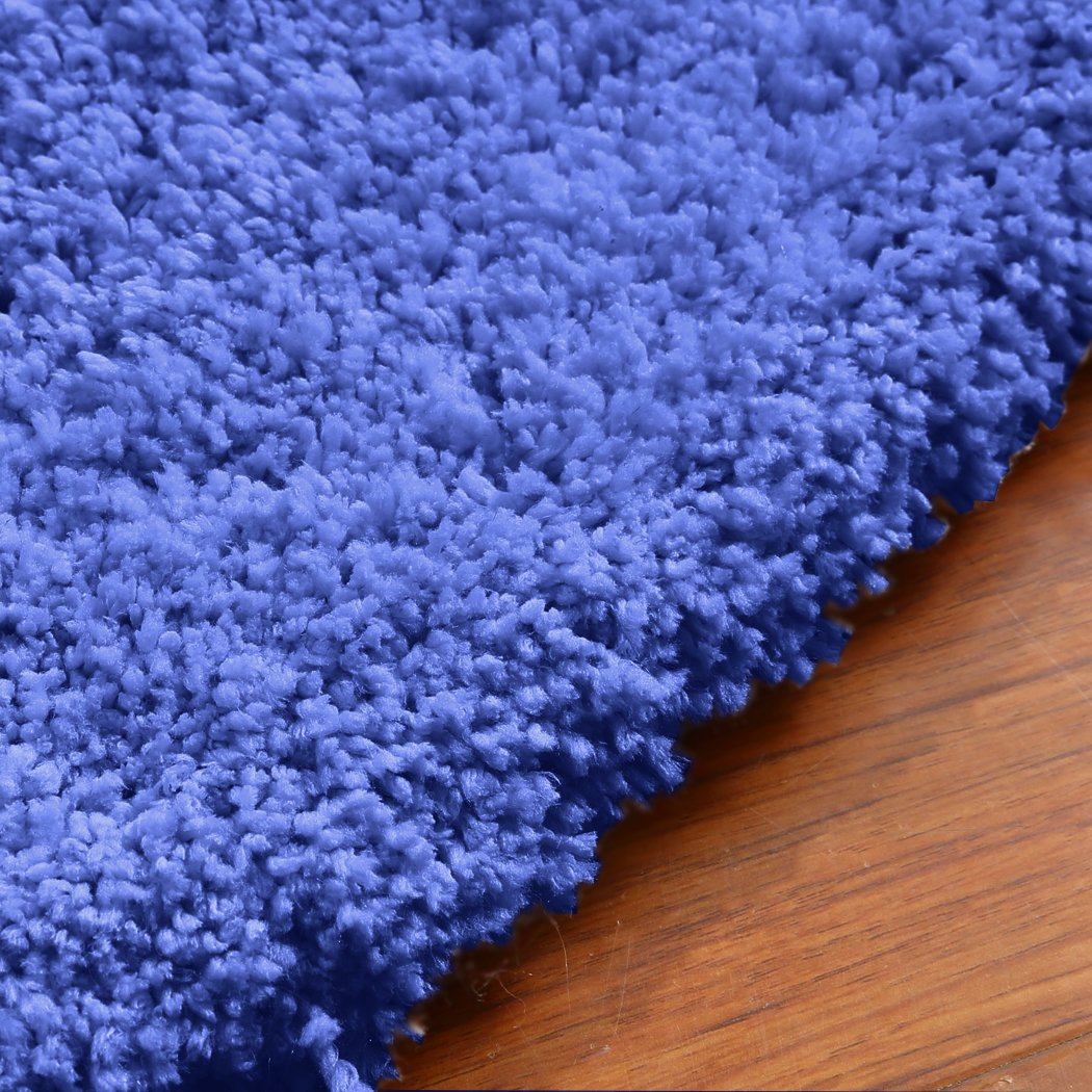 Ultra Soft Anti Slip Rectangle Plush Shaggy Floor Rug in blue, measuring 120x170cm, showcasing its thick pile and non-slip backing.