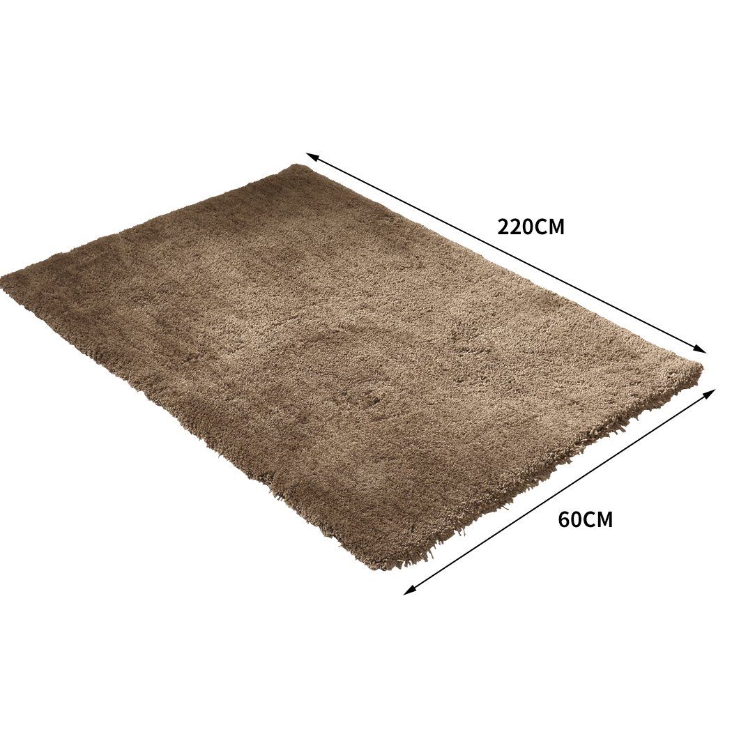 Ultra Soft Anti Slip Rectangle Plush Shaggy Floor Rug in Taupe, showcasing its thick pile and non-slip backing.