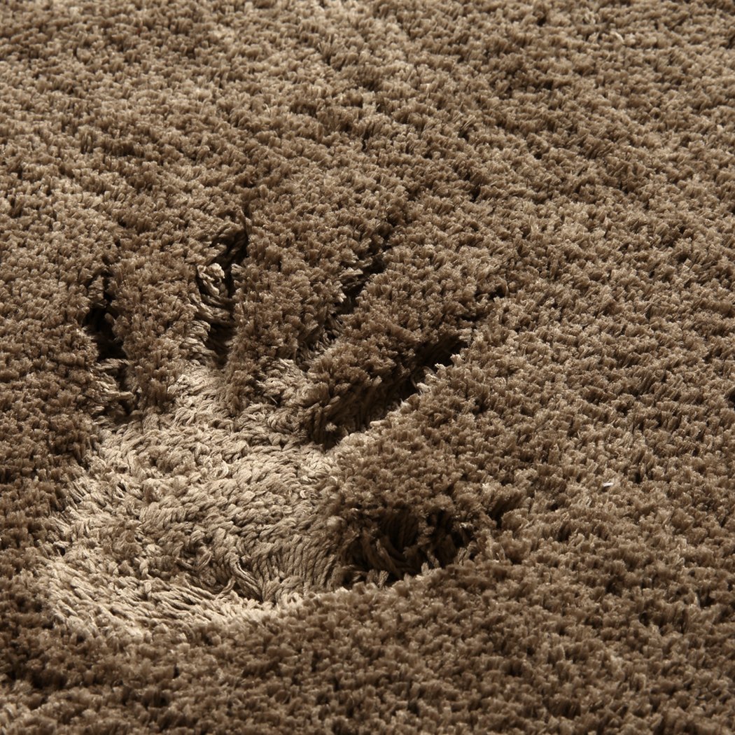 Ultra Soft Anti Slip Rectangle Plush Shaggy Floor Rug in Taupe, showcasing its thick pile and non-slip backing.