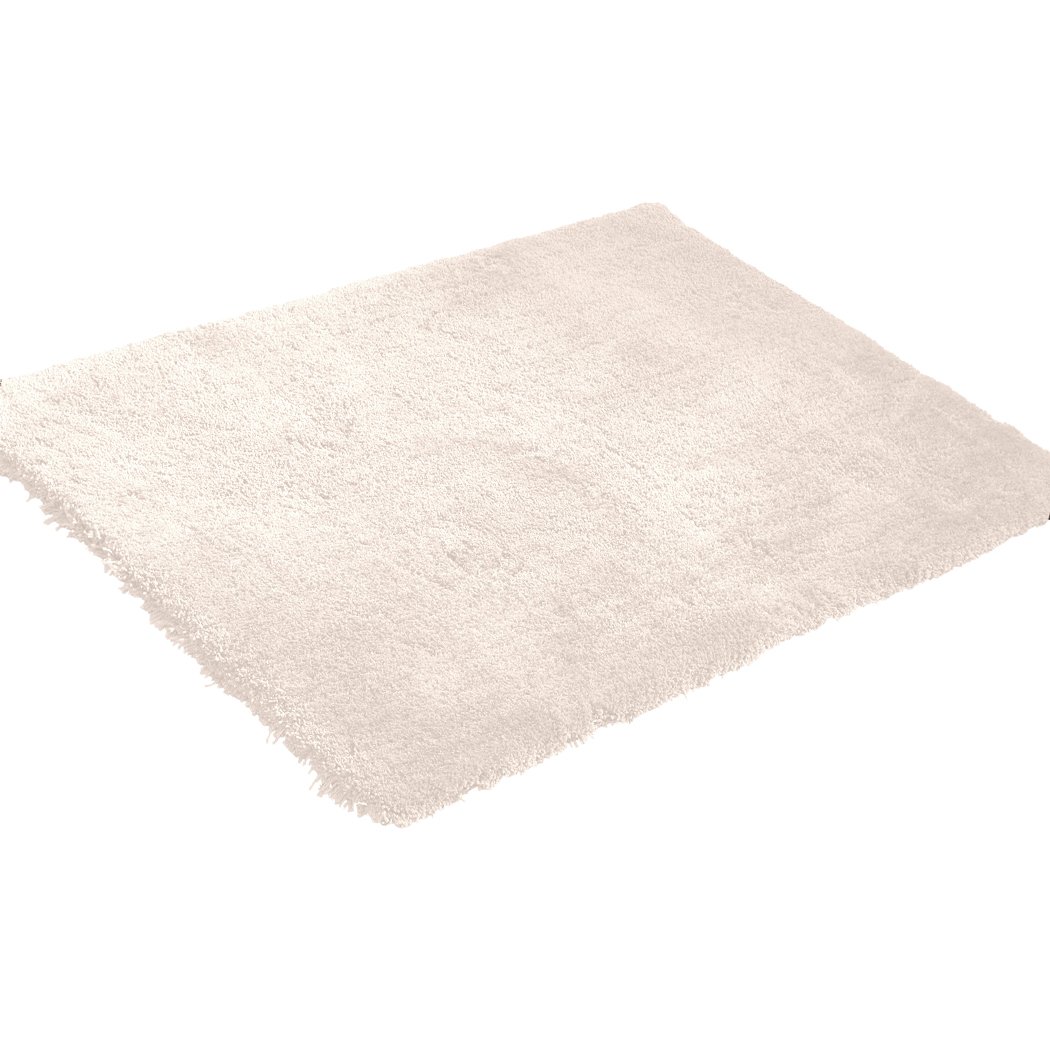 Ultra Soft Anti Slip Rectangle Plush Shaggy Floor Rug in Beige, showcasing its thick pile and non-slip backing, perfect for home decor.