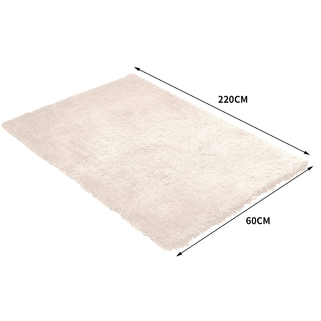 Ultra Soft Anti Slip Rectangle Plush Shaggy Floor Rug in Beige, showcasing its thick pile and non-slip backing, perfect for home decor.