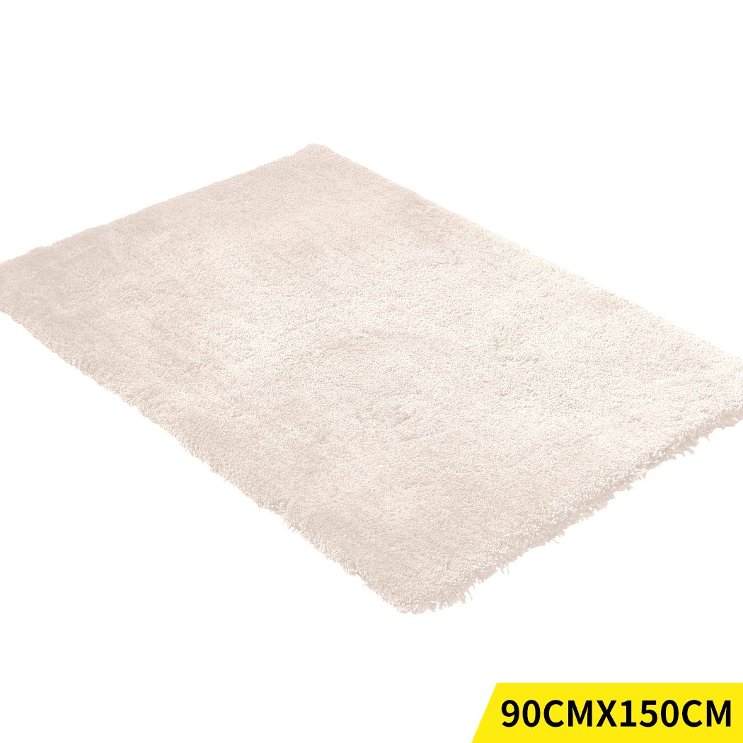 Ultra Soft Anti Slip Rectangle Plush Shaggy Floor Rug in Beige, showcasing its thick pile and non-slip backing, perfect for home decor.