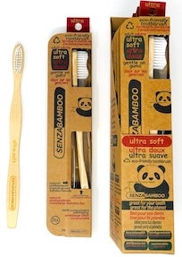 Ultra Soft Bamboo Toothbrush with a gentle nylon bristle head and an ergonomic bamboo handle, showcasing its eco-friendly design.