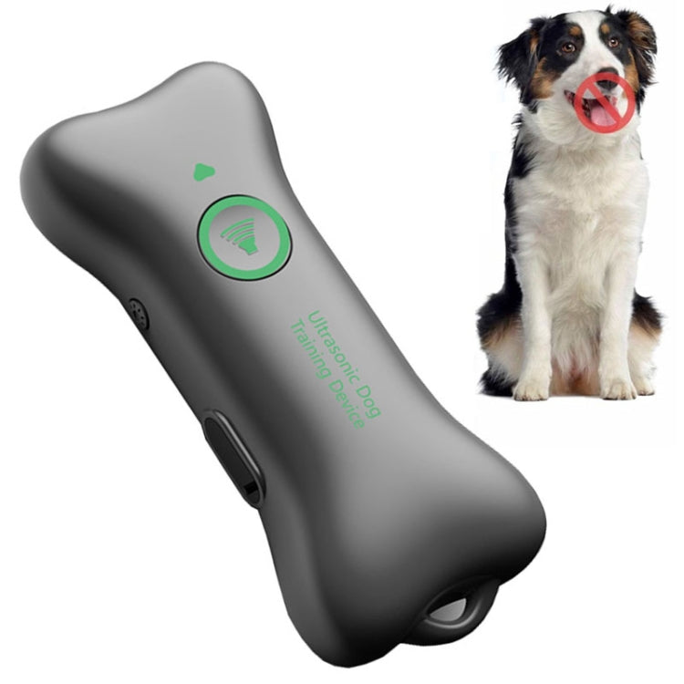 Ultrasonic Automatic Dog Barking Device in a handheld design, featuring a sleek surface with oil spray and night reflection for easy visibility.