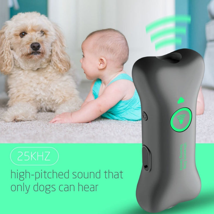 Ultrasonic Automatic Dog Barking Device in a handheld design, featuring a sleek surface with oil spray and night reflection for easy visibility.