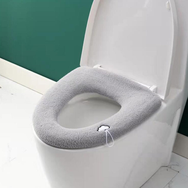 Universal Knitted Washable Toilet Pad in soft knitted fabric, designed for comfort and warmth, fits various toilet seat shapes.