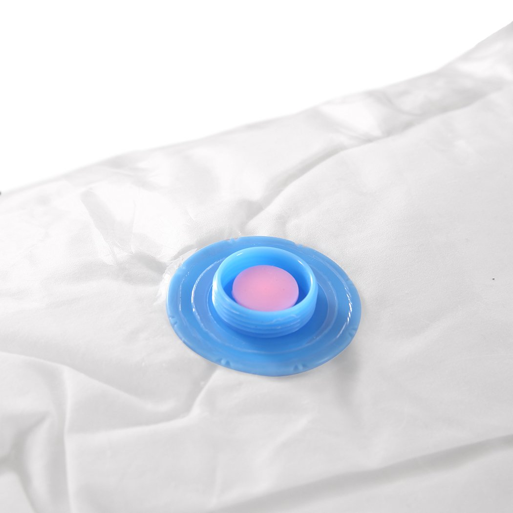 A set of transparent vacuum storage bags with an air pump, ideal for compressing clothes and quilts to save space.