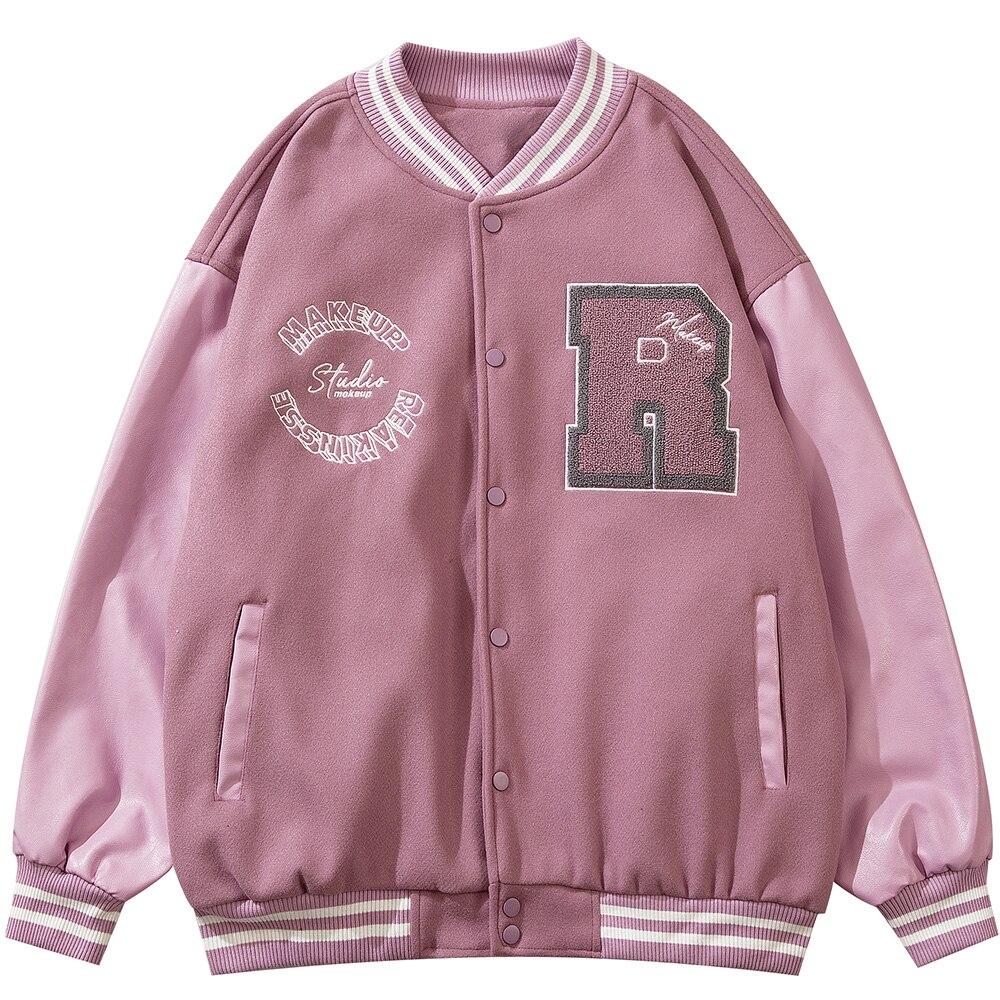 Men's varsity jacket featuring leather patchwork and letter patches, available in black and pink colors.