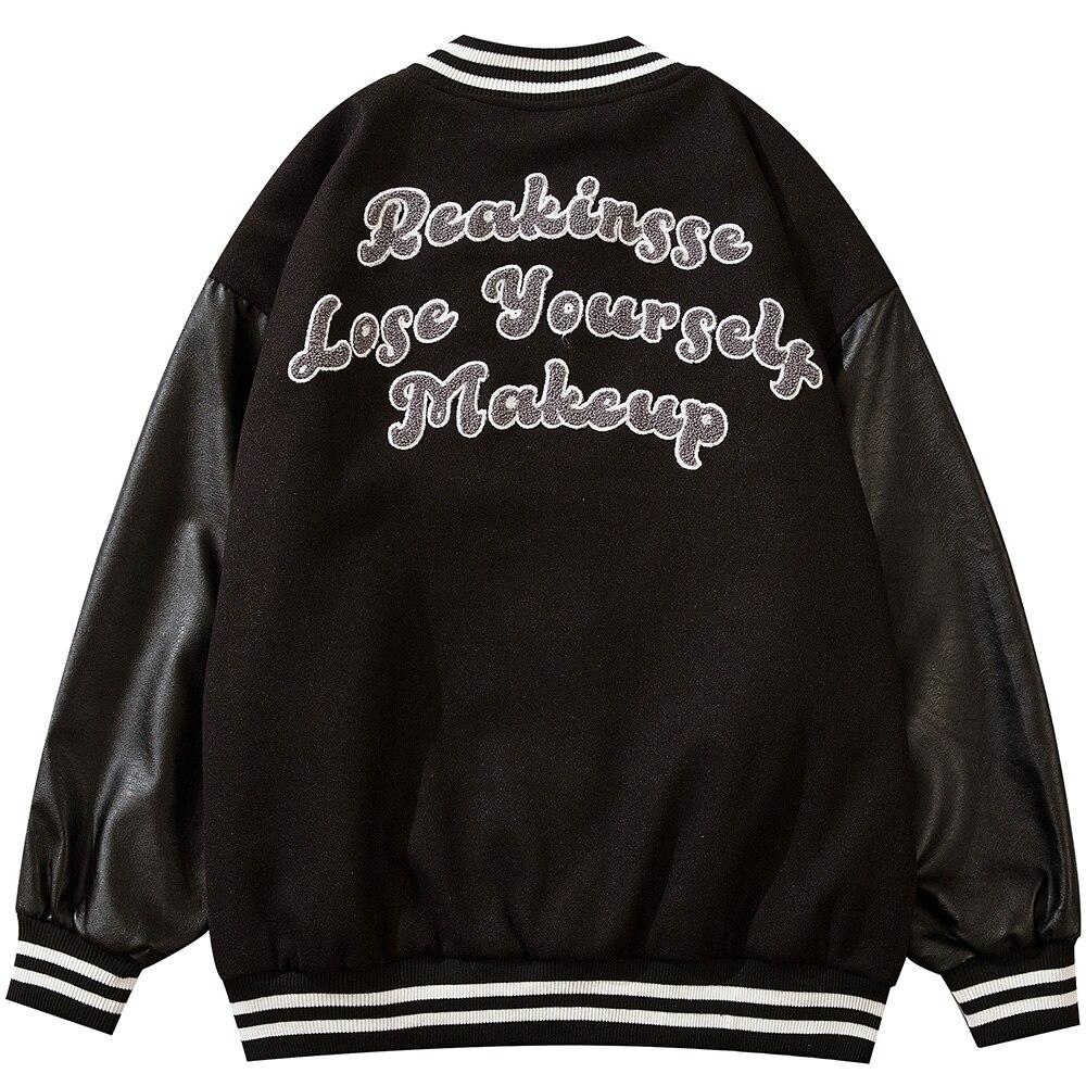 Men's varsity jacket featuring leather patchwork and letter patches, available in black and pink colors.