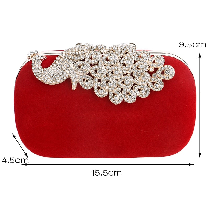 A luxurious velvet evening bag for women featuring a rhinestone flower design, perfect for parties and formal occasions.