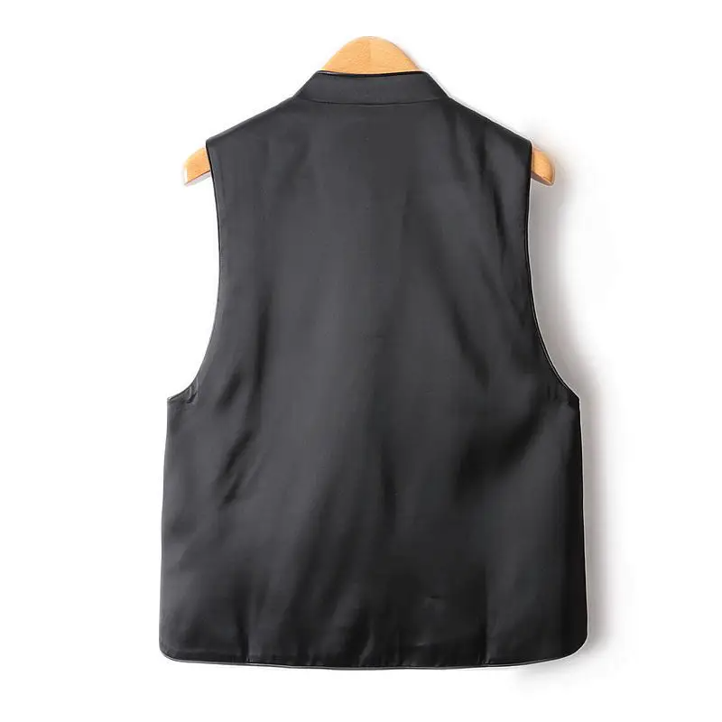 Elegant Chinese style vest for women featuring disc button closure and stand collar, made from soft polyester fabric.