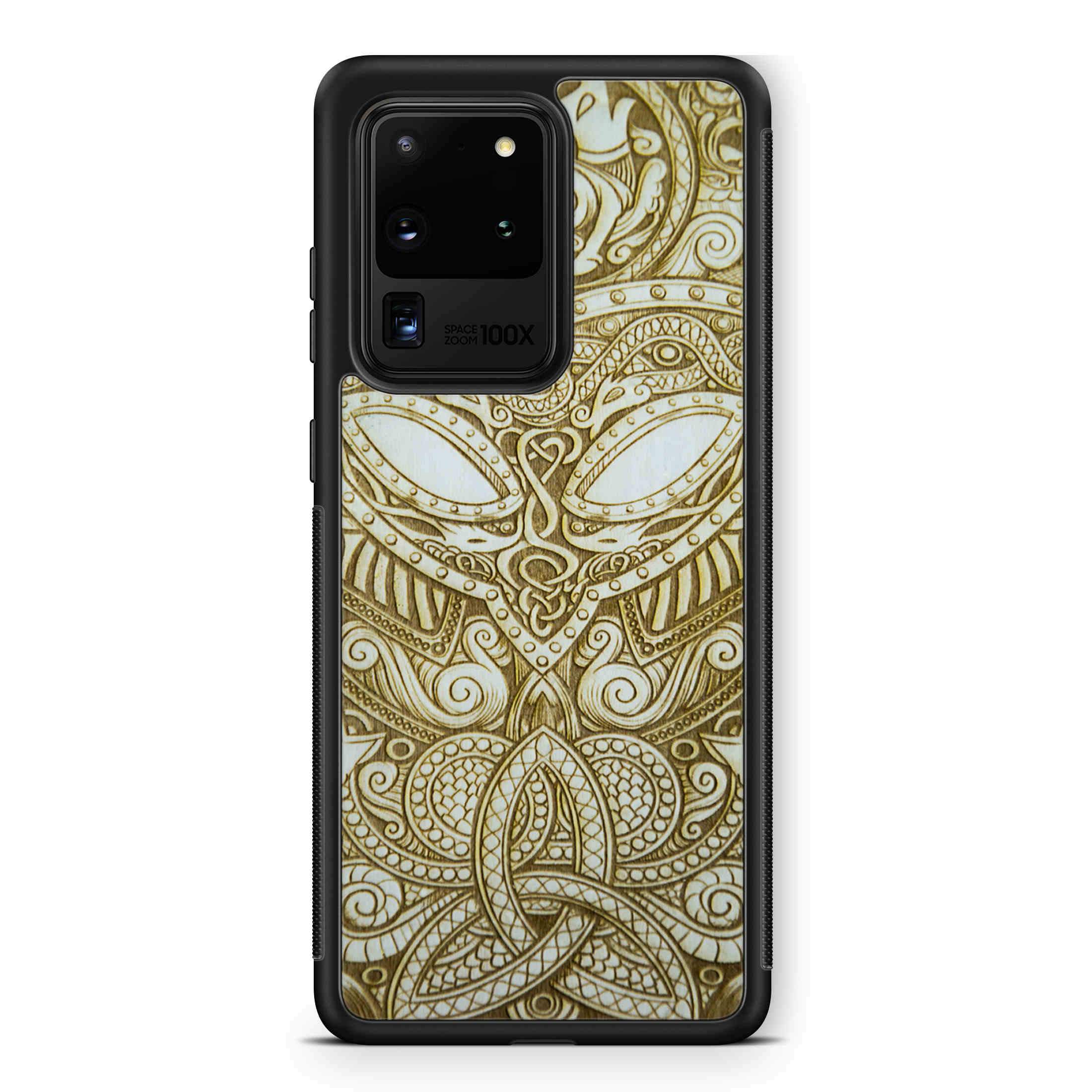 Handcrafted Viking wooden phone case showcasing unique wood grain and Norse symbols, held in a woman's hand.