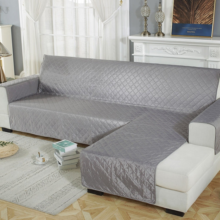 Waterproof non-slip pet cushion sofa cover in a living room setting, showcasing its stylish design and protective features.