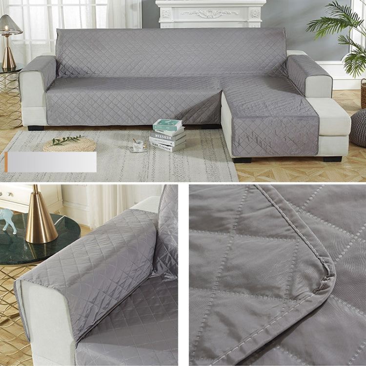 Waterproof non-slip pet cushion sofa cover in a living room setting, showcasing its stylish design and protective features.