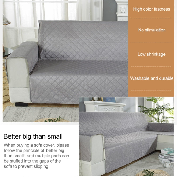 Waterproof non-slip pet cushion sofa cover in a living room setting, showcasing its stylish design and protective features.