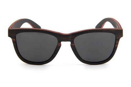 Wave Sunglasses made from skateboard wood with ebony frame and polarized lenses, displayed in a stylish wood box.