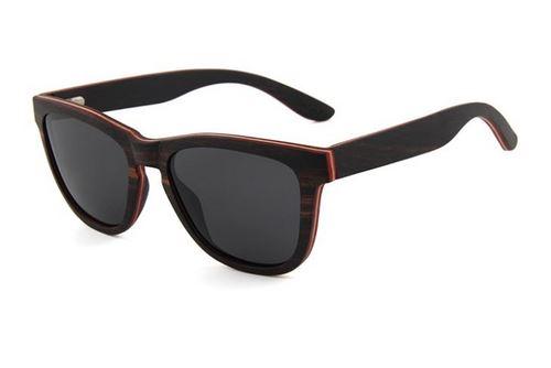 Wave Sunglasses made from skateboard wood with ebony frame and polarized lenses, displayed in a stylish wood box.