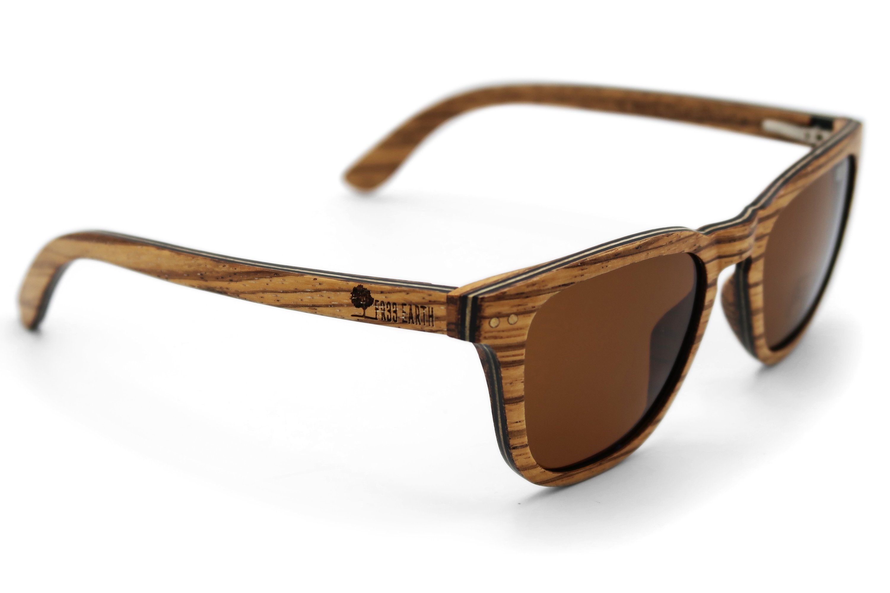 Wave Zebra Sunglasses featuring a unique zebra wood frame and polarized lenses, elegantly displayed in eco-friendly packaging.