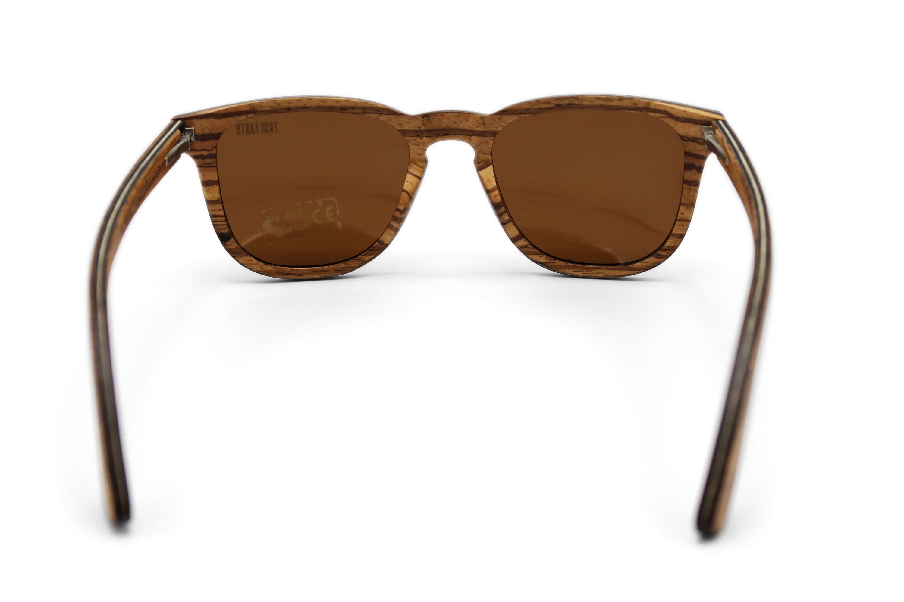 Wave Zebra Sunglasses featuring a unique zebra wood frame and polarized lenses, elegantly displayed in eco-friendly packaging.