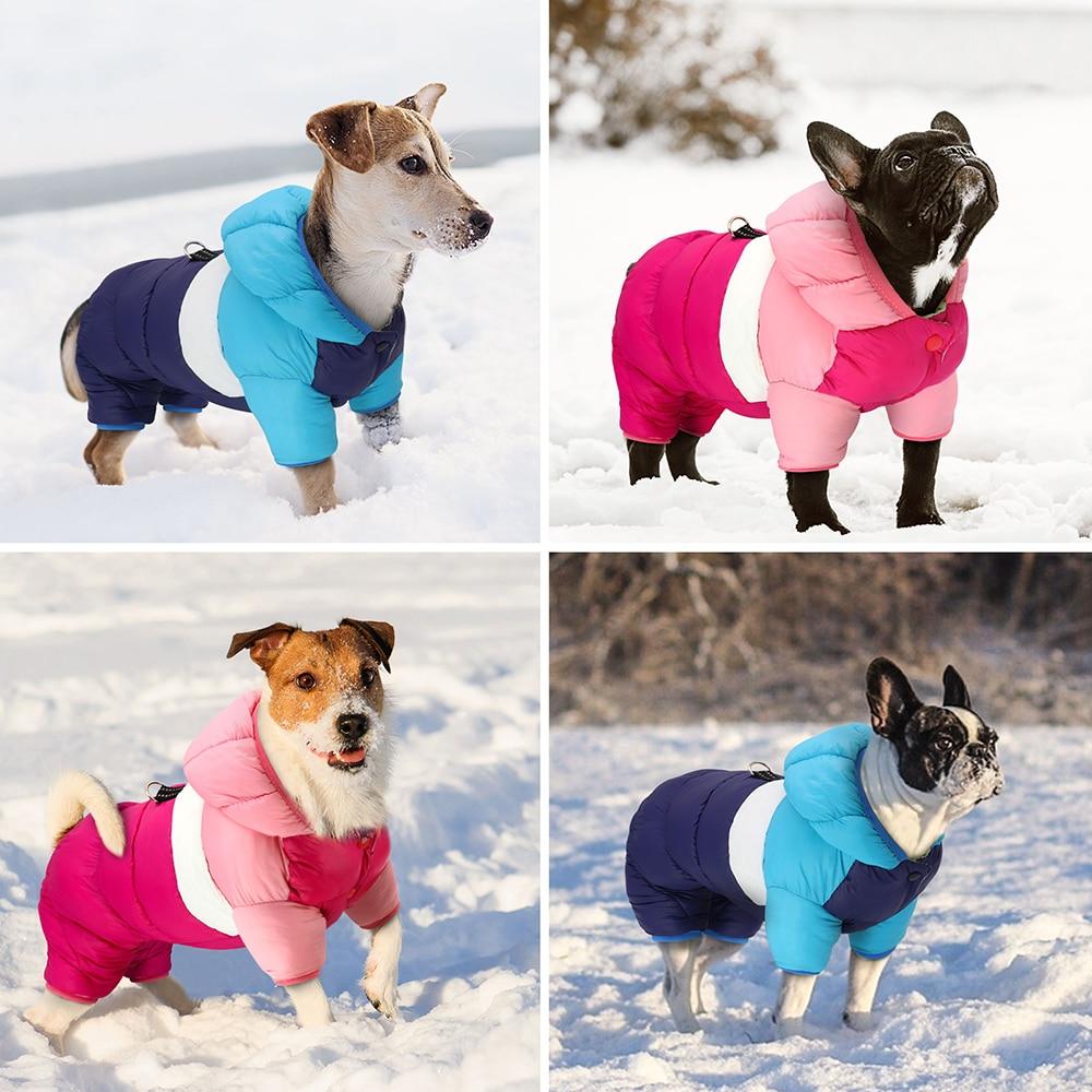 A thick, warm winter dog jacket in blue, featuring a reflective harness and waterproof material, designed for comfort and style.