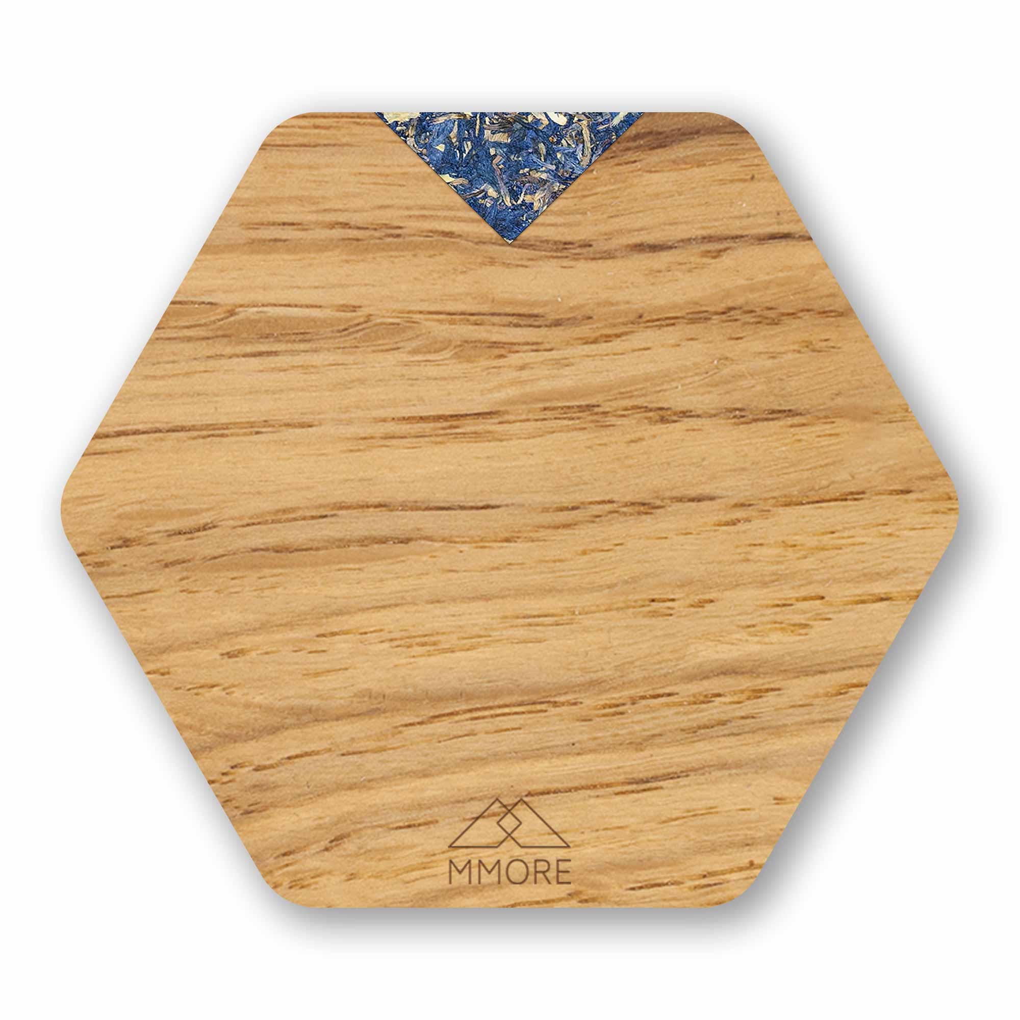 Set of 4 handcrafted wooden coasters made from oak, showcasing unique grain patterns and a modern hexagonal design.