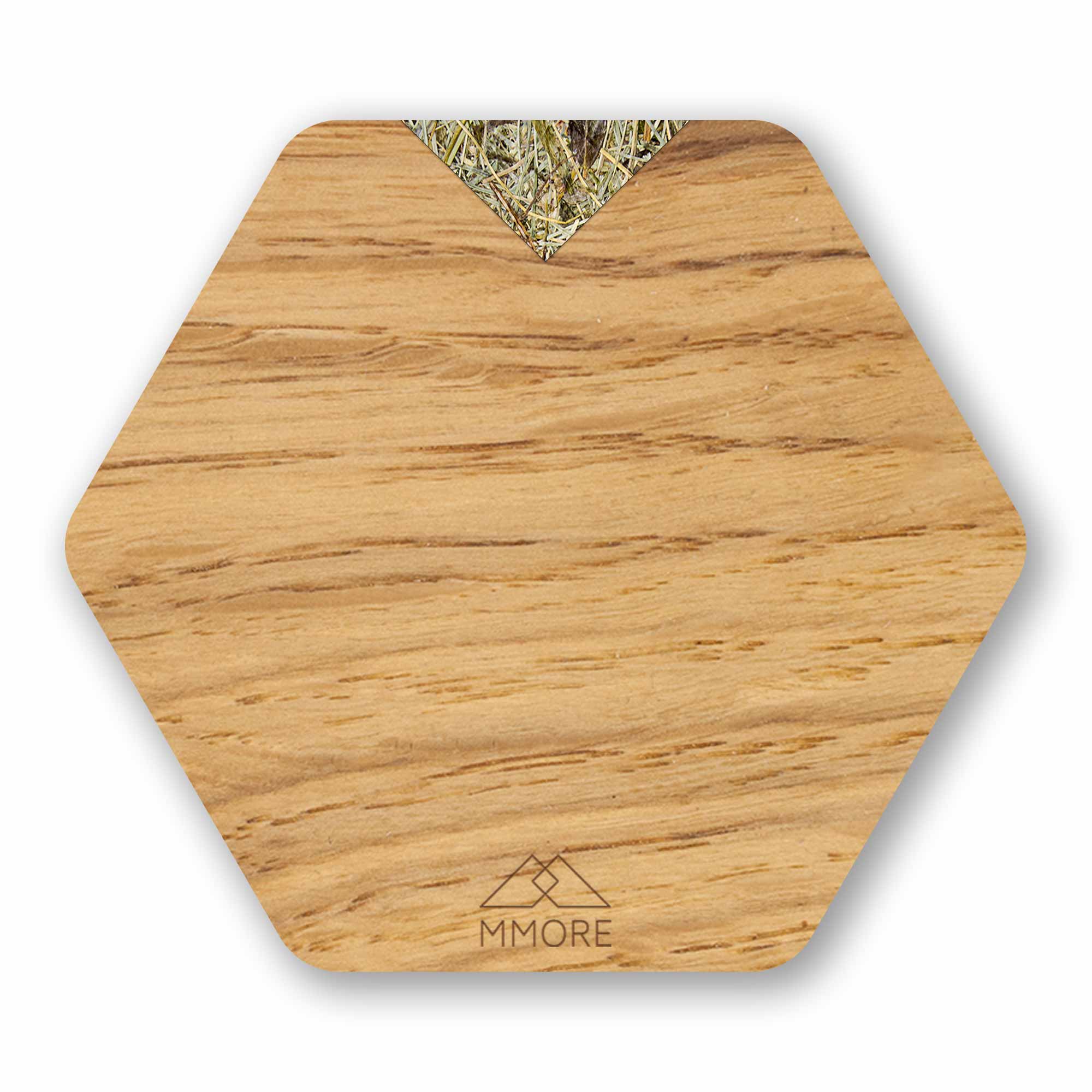 Set of 4 handcrafted wooden coasters made from oak, showcasing unique grain patterns and a modern hexagonal design.