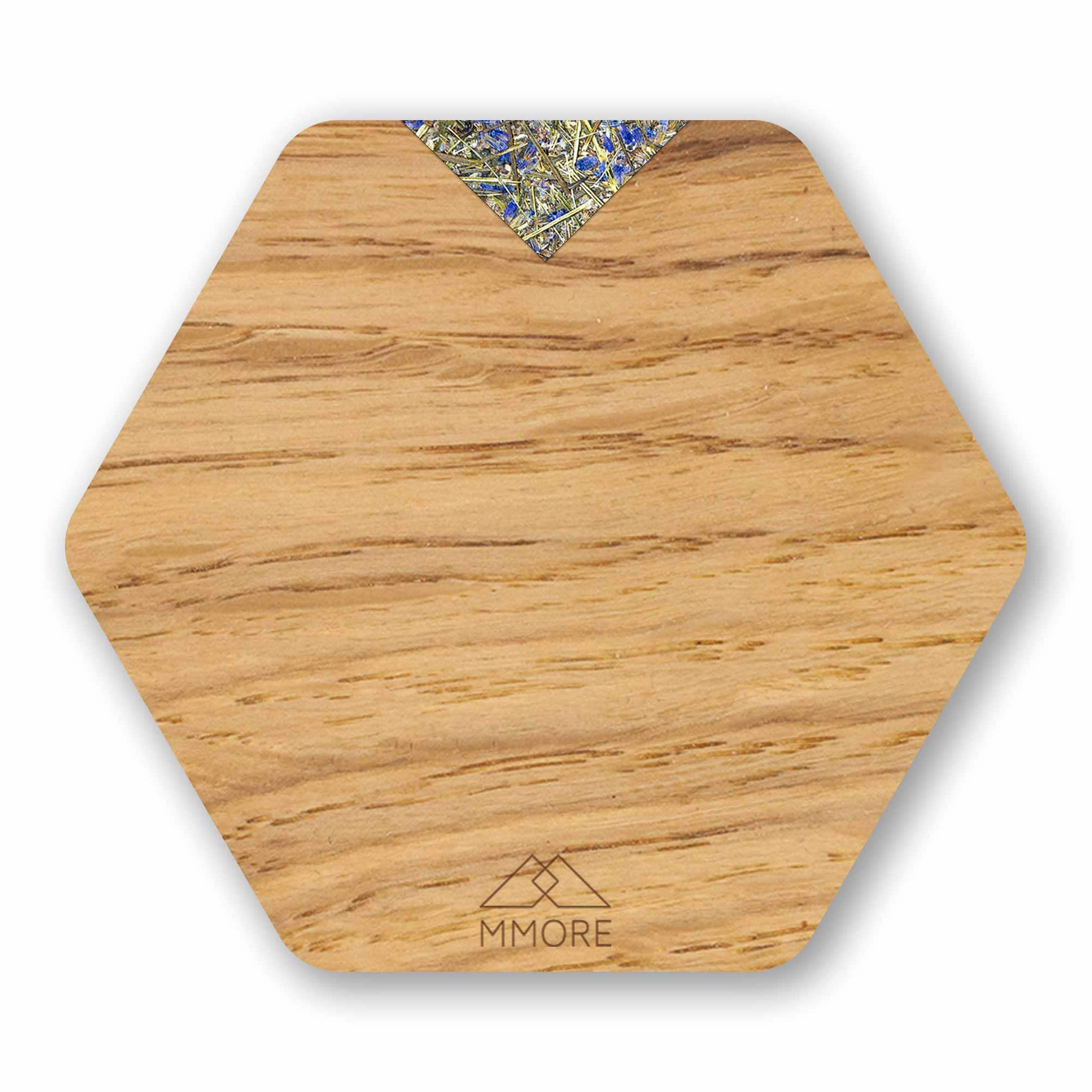 Set of 4 handcrafted wooden coasters made from oak, showcasing unique grain patterns and a modern hexagonal design.