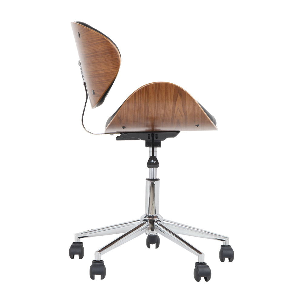 Wooden and PU leather office desk chair in black with a winged back and cushioned seat, featuring a chrome base and castor wheels.