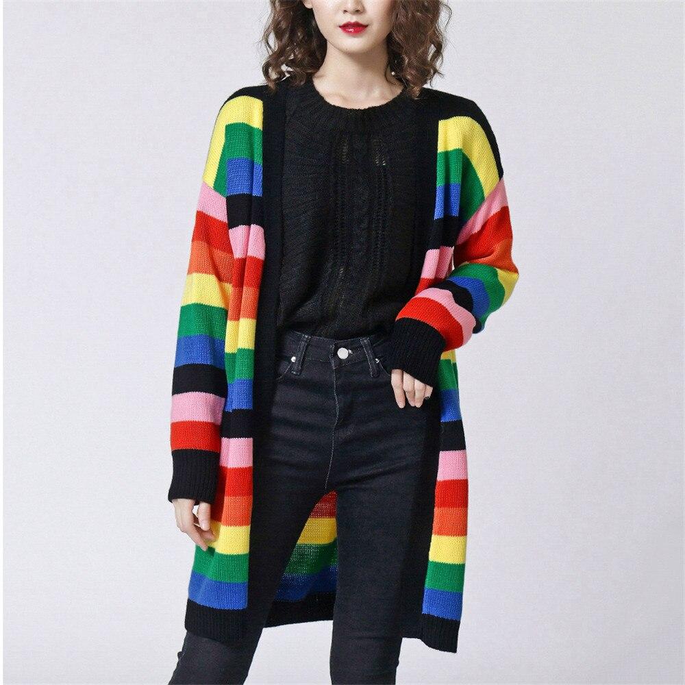 A vibrant Women Rainbow Oversized Cardigan featuring a striped pattern, long sleeves, and a cozy V-neck design, perfect for stylish layering.