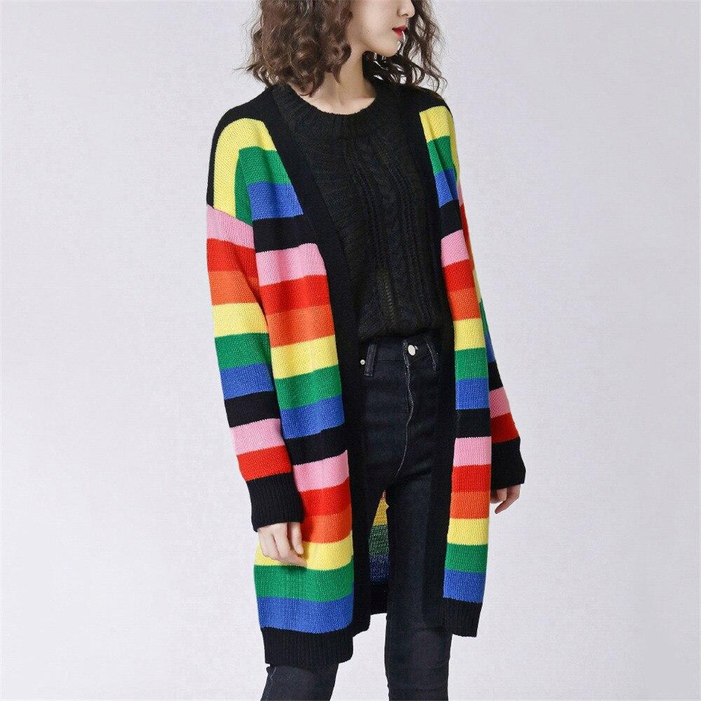 A vibrant Women Rainbow Oversized Cardigan featuring a striped pattern, long sleeves, and a cozy V-neck design, perfect for stylish layering.