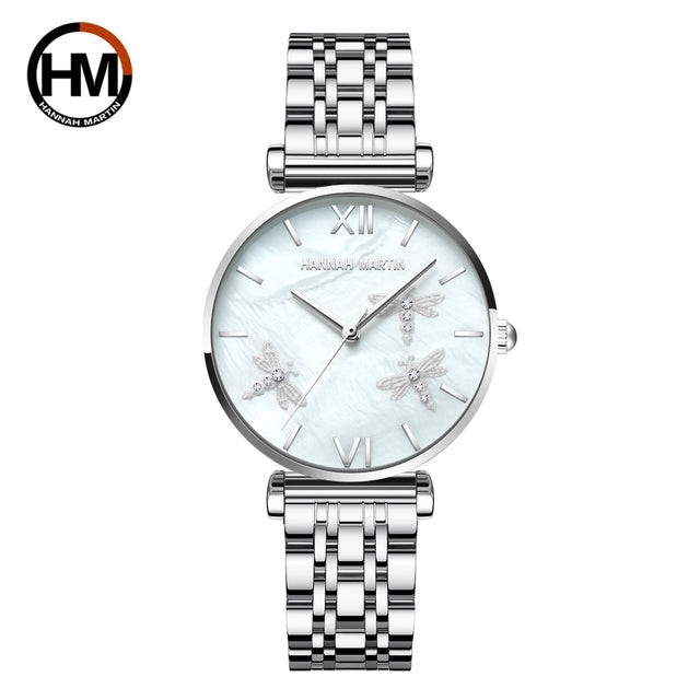 Elegant women’s rose gold quartz wristwatch with rhinestones and stainless steel band, showcasing a luxurious design.