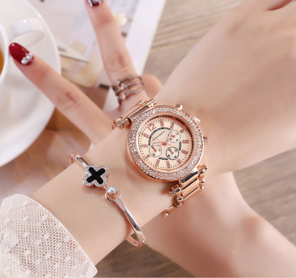 Elegant women’s rose gold quartz wristwatch with rhinestones and stainless steel band, showcasing a luxurious design.