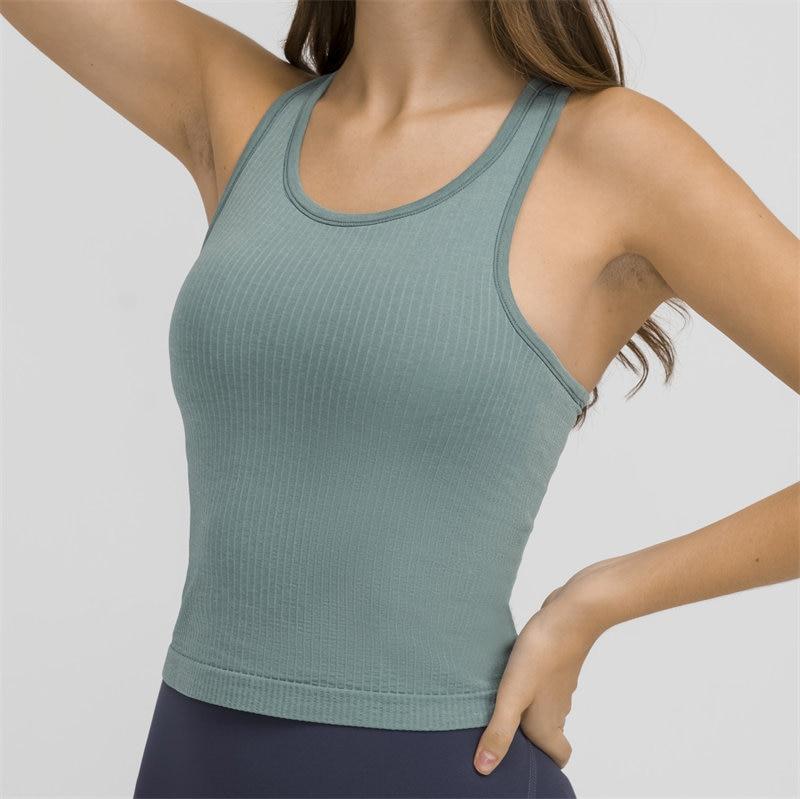 Women wearing a seamless full-length racerback tank top with built-in bra, ideal for workouts and fitness activities.