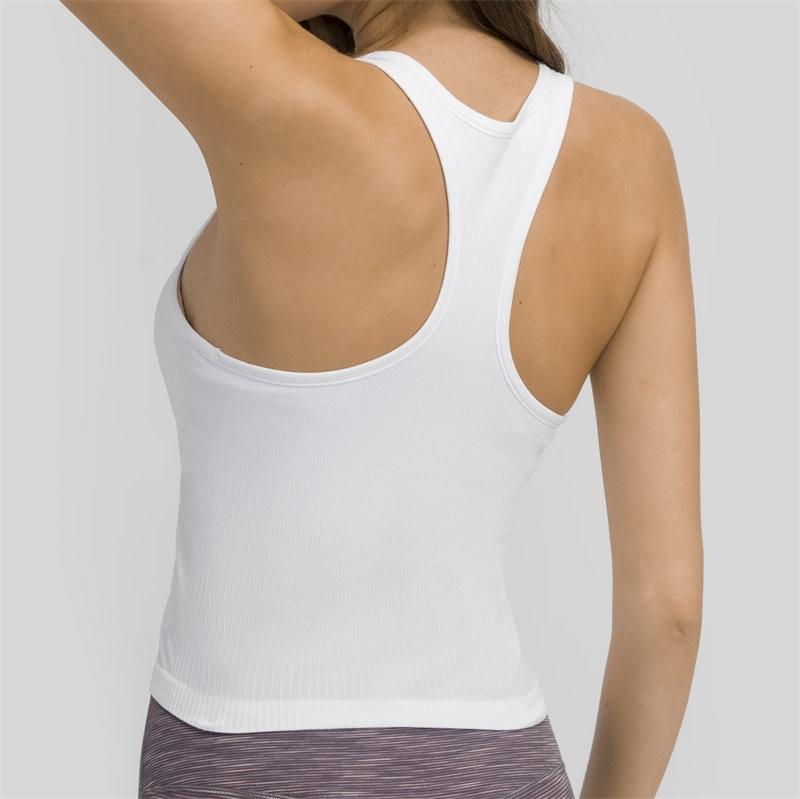 Women wearing a seamless full-length racerback tank top with built-in bra, ideal for workouts and fitness activities.